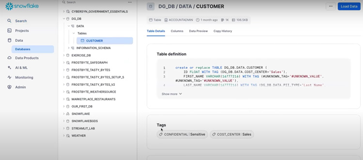 Snowflake database interface displaying table definition and applied tags.